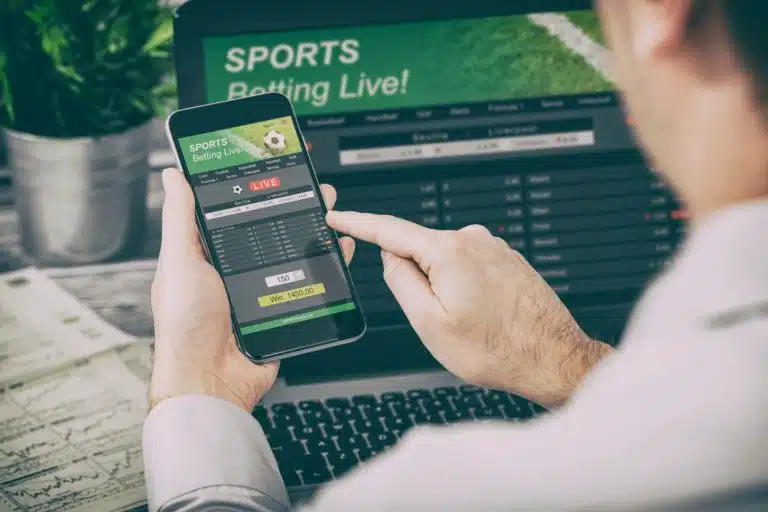 betting bet sport phone gamble laptop concept